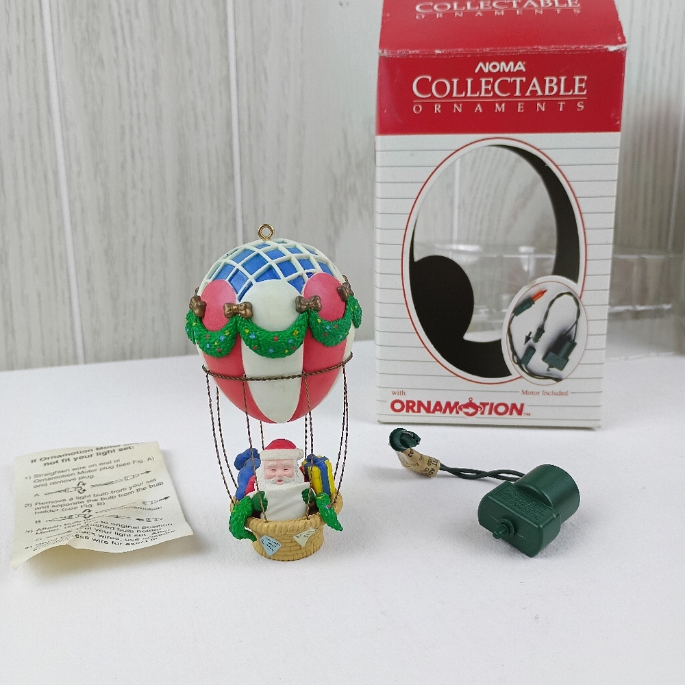 Vintage 1989 Noma Ornamotion Christmas Ornament Santa's Hot Air Balloon Clause.
